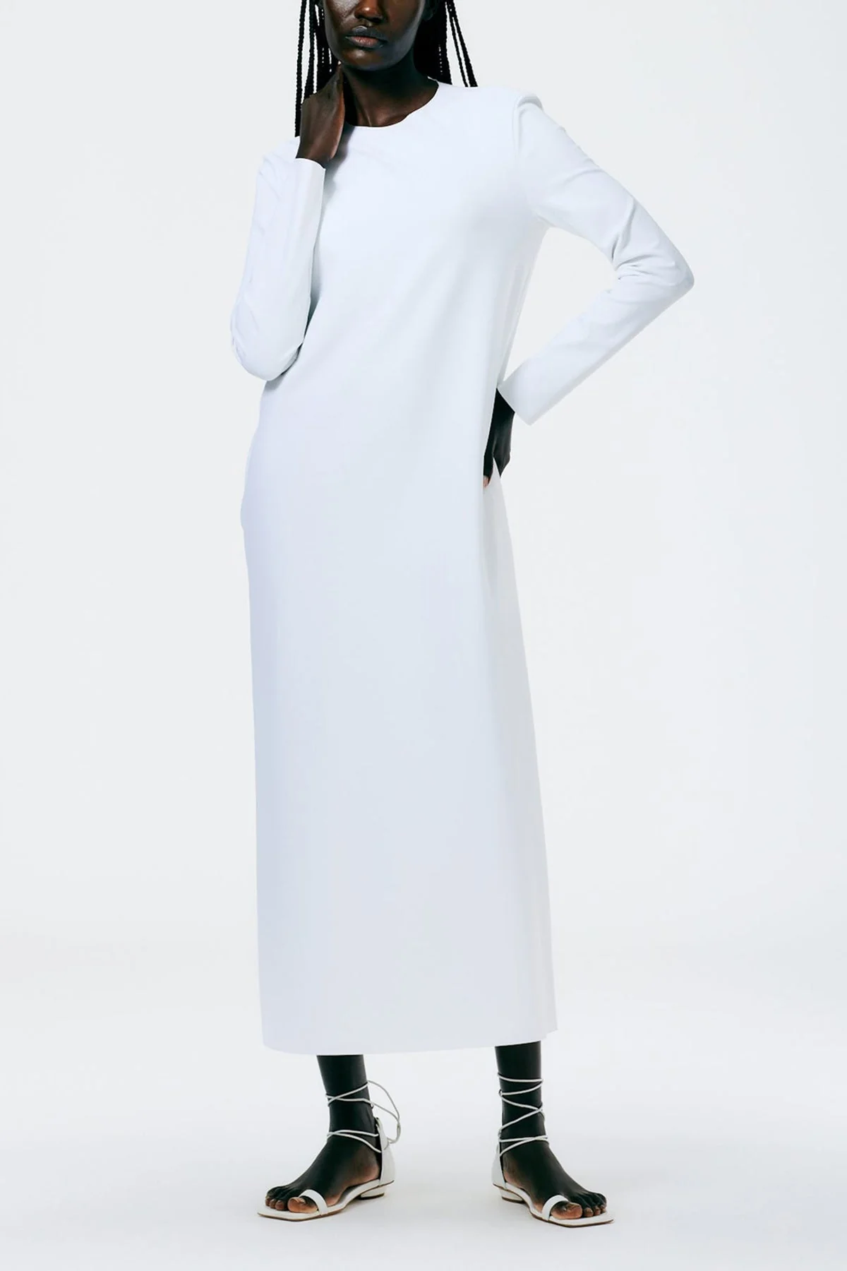 Compact Ultra Stretch Knit Long Sleeve Open Back Dress in White