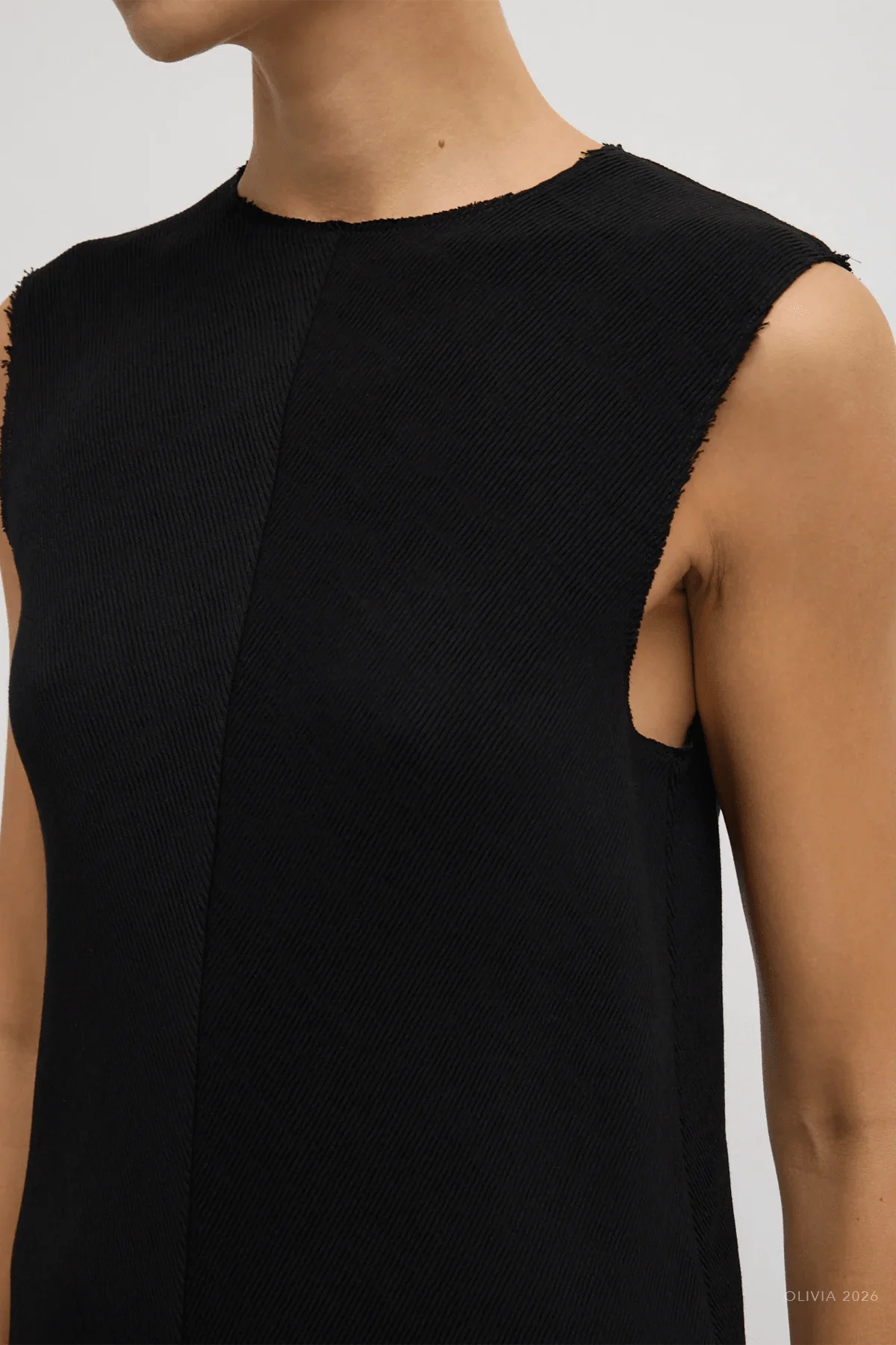 Viscose Plisse Sleeveless Bias Short Tunic Dress in Black - Image 4